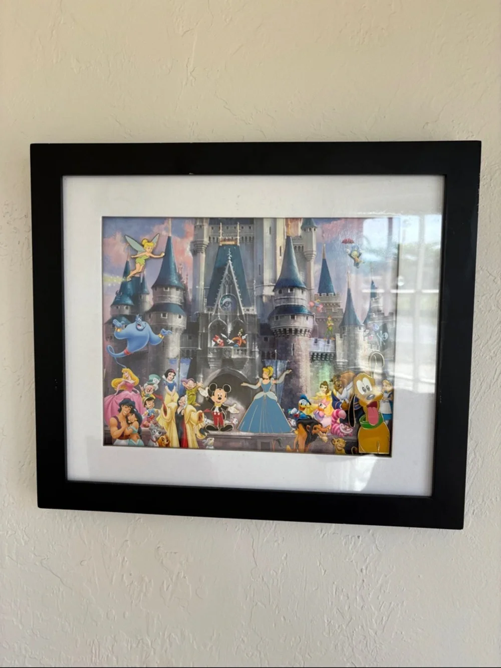 Disney Cinderella Castle lithograph print that includes four‎ collectible pins